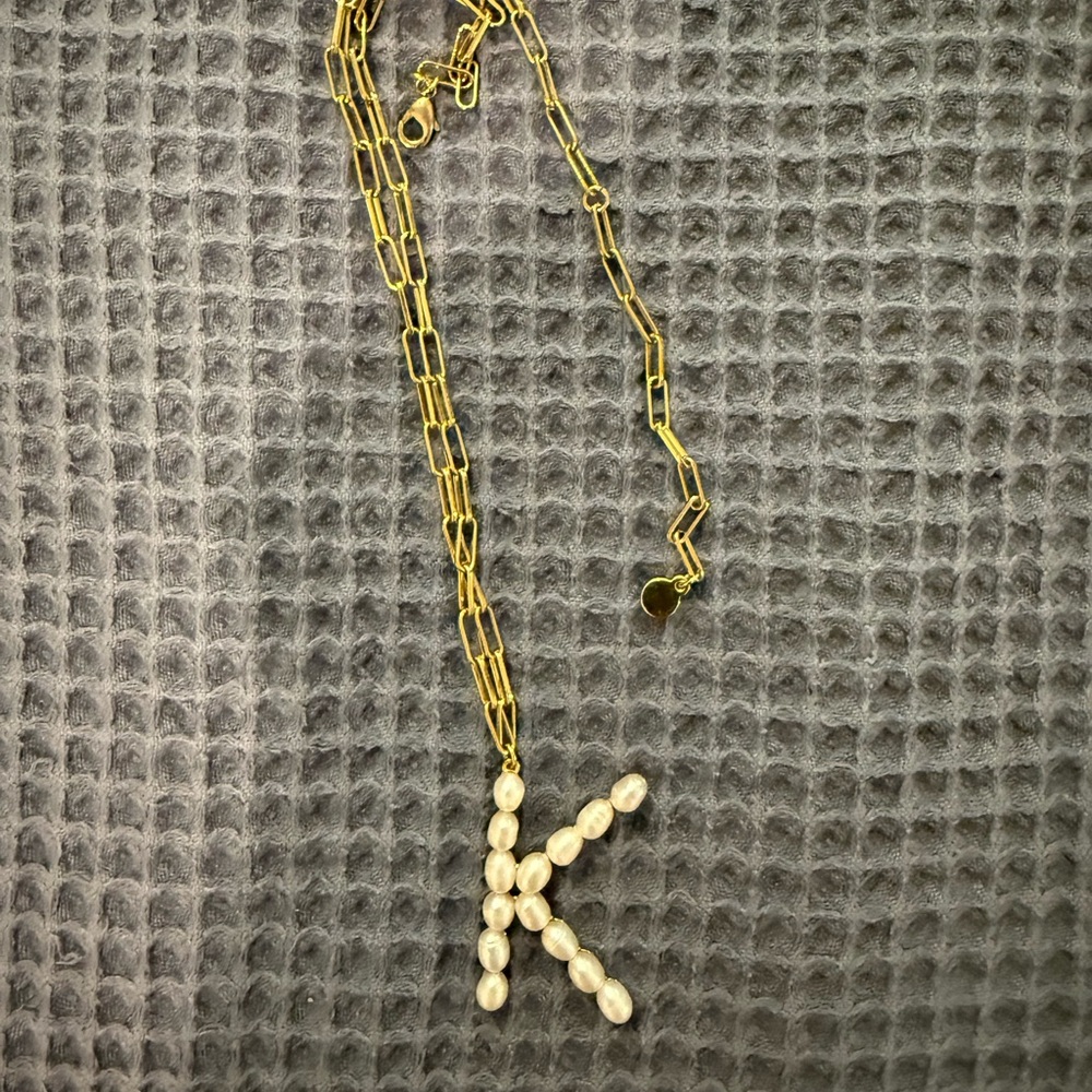 Bauble bar gold color and pearl like statement necklace. Great condition